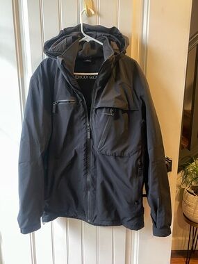 Body Glove Protect The Core ski rain jacket in black.